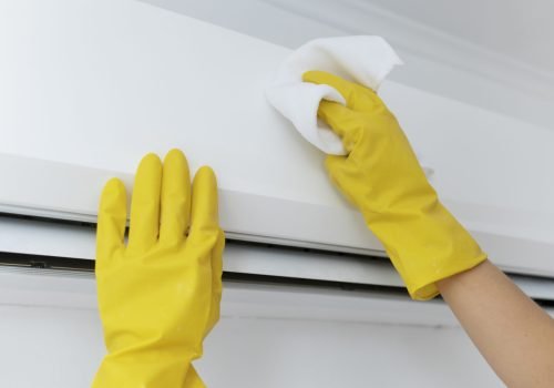 person-taking-care-office-cleaning